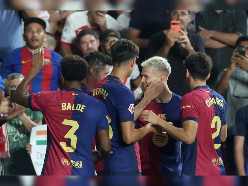 Title: Barcelona Comeback Victory Secured by Dani Olmo in La Liga Debut Against Rayo