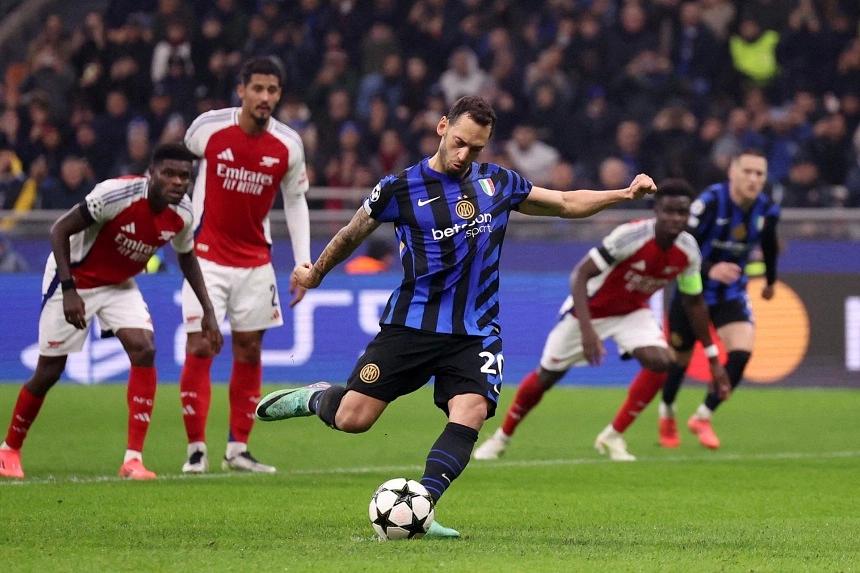 Hakan Calhanoglu's Winning Goal Leads Unbeaten Inter Milan to Victory over Arsenal in Champions League